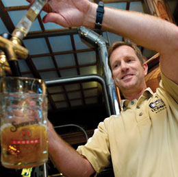 Photo: Brewer filling glass stein