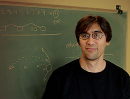 The biologist in front of a chalkboard
