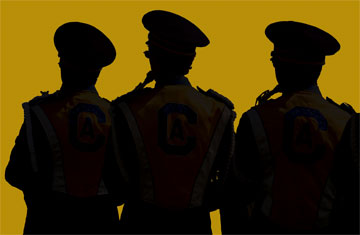 Photo: silhouette of three band members