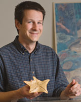 Photo: Jay Stachowicz holding starfish