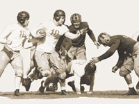 Photo: archival photo of football scrimmage