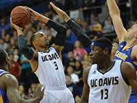 Photo: UC Davis basketball player Corey Hawkins attemptint to shoot over UC Riverside players