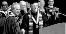 Photo: Then UC President Jack Peltason shaking hands with Vanderhoef at his inauguration