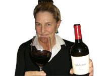Photo: Winemaker Zelma Long with bottle and glass of red wine