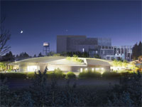 An architectural rendering of the future art museum at night