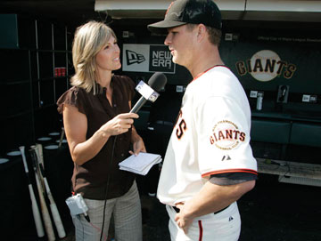 Photo: Amy Gutierrez talks with one of the Giants